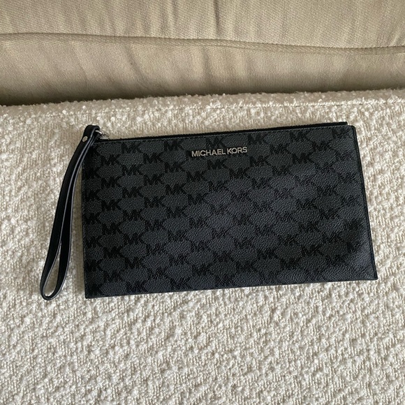 Michael Kors Handbags - Michael Kors Monogram Black Clutch